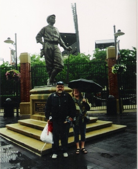 Danny and Mary standing in front of Babe Ruth Statue