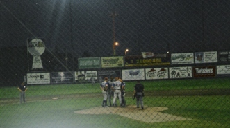 visiting team conference on pitcher's mound